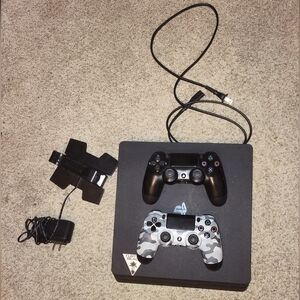 PS4 Slim 1TB with 2 controllers and charging stand